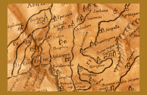 Weathered map with mountains and houses