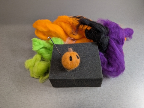 needle felted jack-o-lantern
