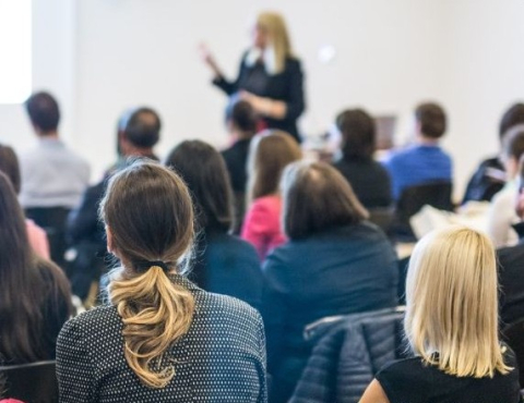 A lecture give to a crowd.