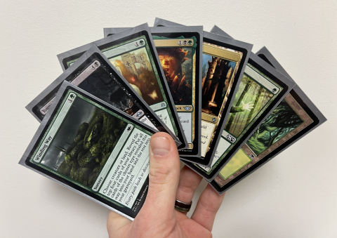 A fanned out hand of Magic the Gathering cards.