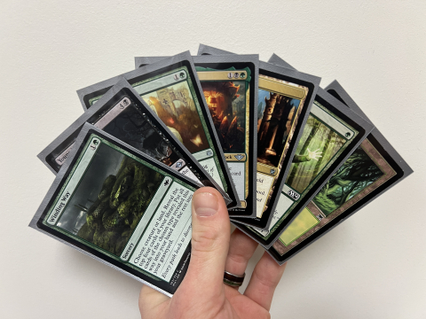 A fanned out hand of Magic the Gathering cards.