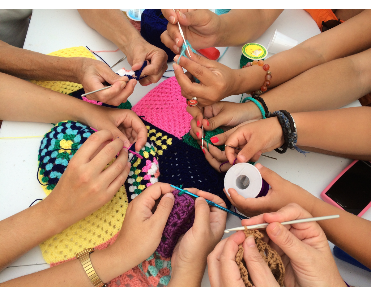 a group of teens crafting